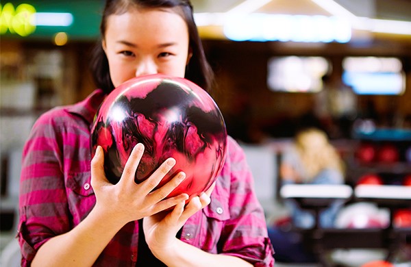 holding bowling