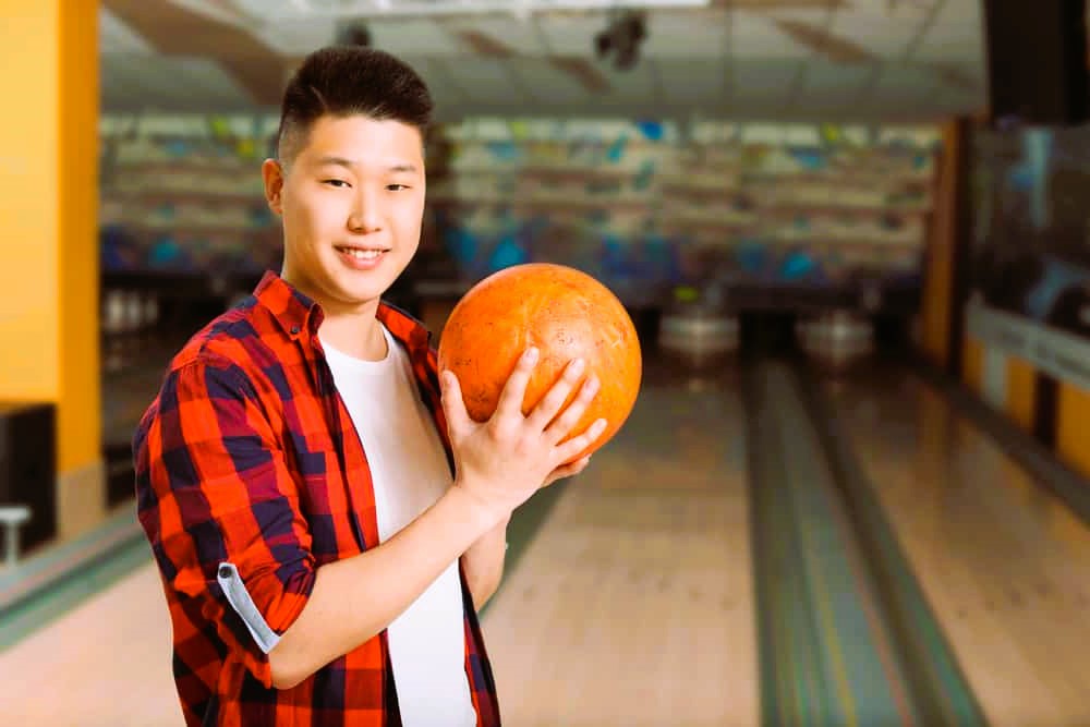 man playing bowling