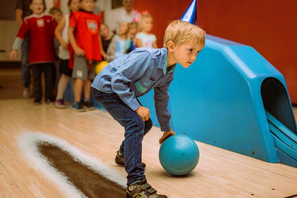 boy at bowling party