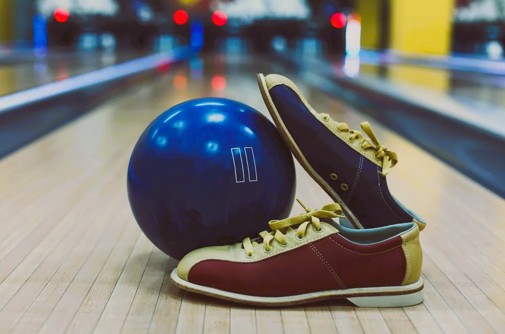 Bowling ball and sneakers